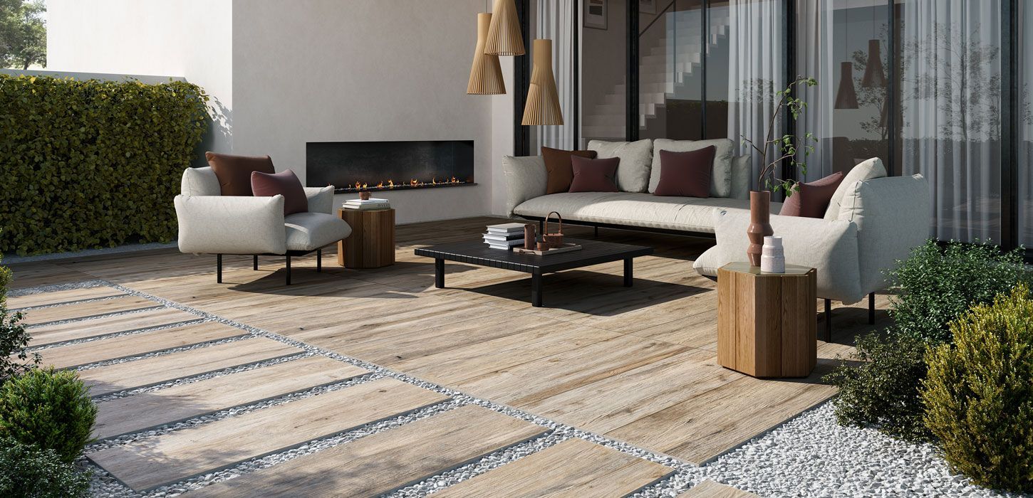 wood effect outdoor tiles used in a garden lounge area