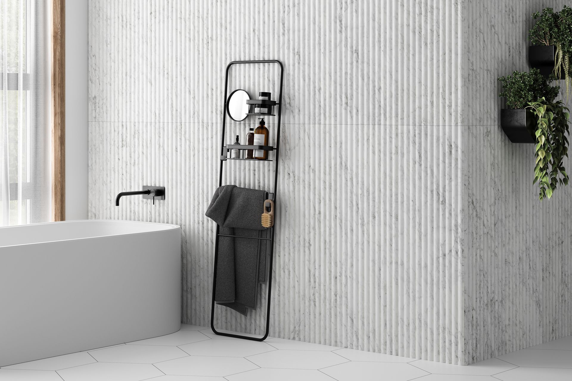 A sleek bathroom showcasing a fluted marble wall with subtle veining, paired with modern black fixtures, a freestanding bathtub, and a minimalistic ladder shelf for accessories.