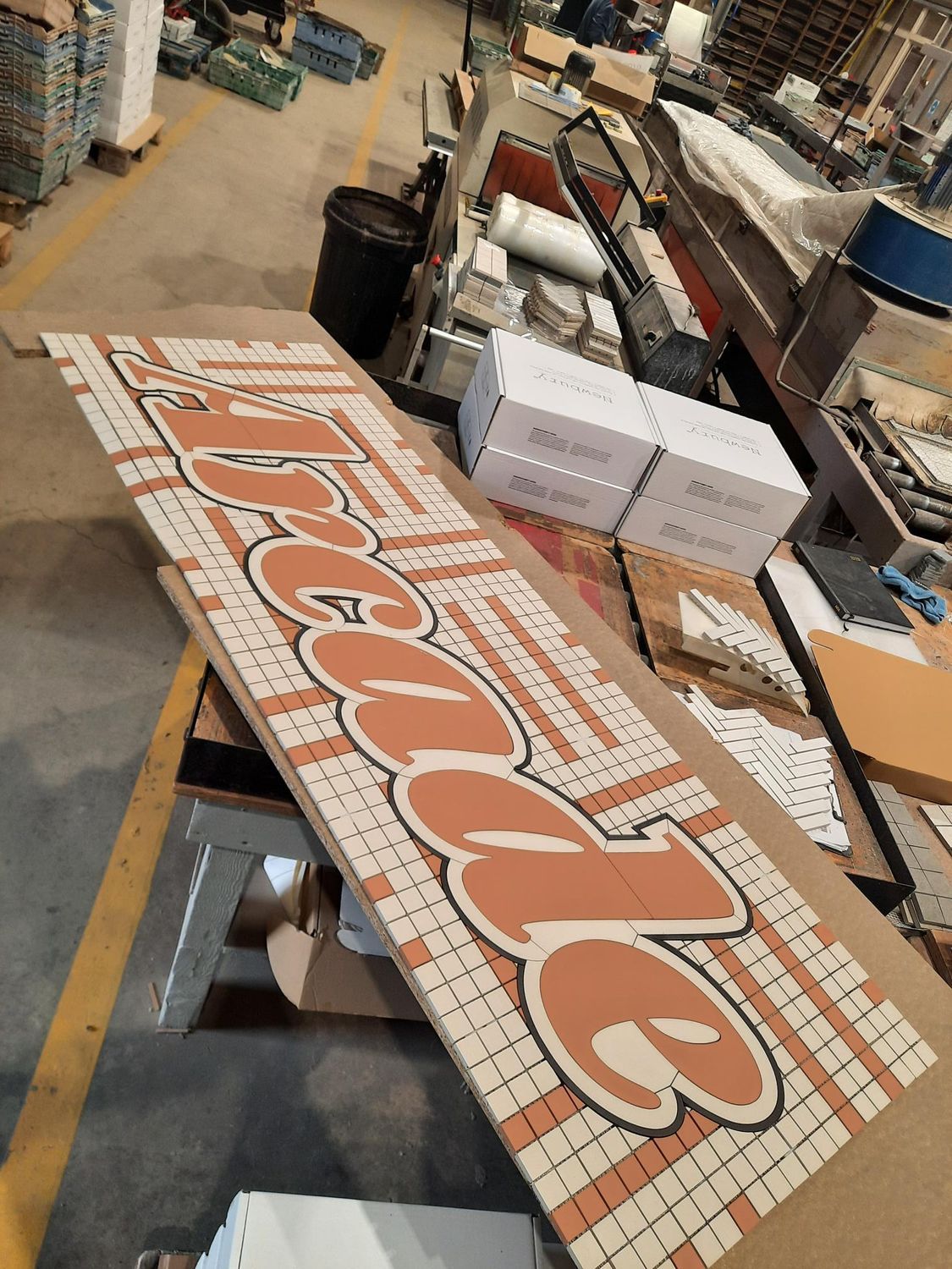 Tiles bespoke arcade logo made from tiles