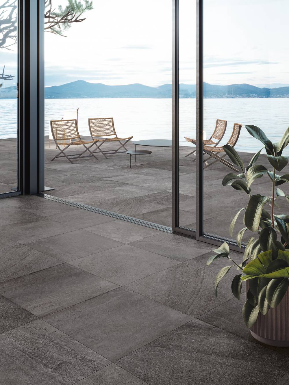 limestone effect tiles used in  a home project with a lounge option on the patio