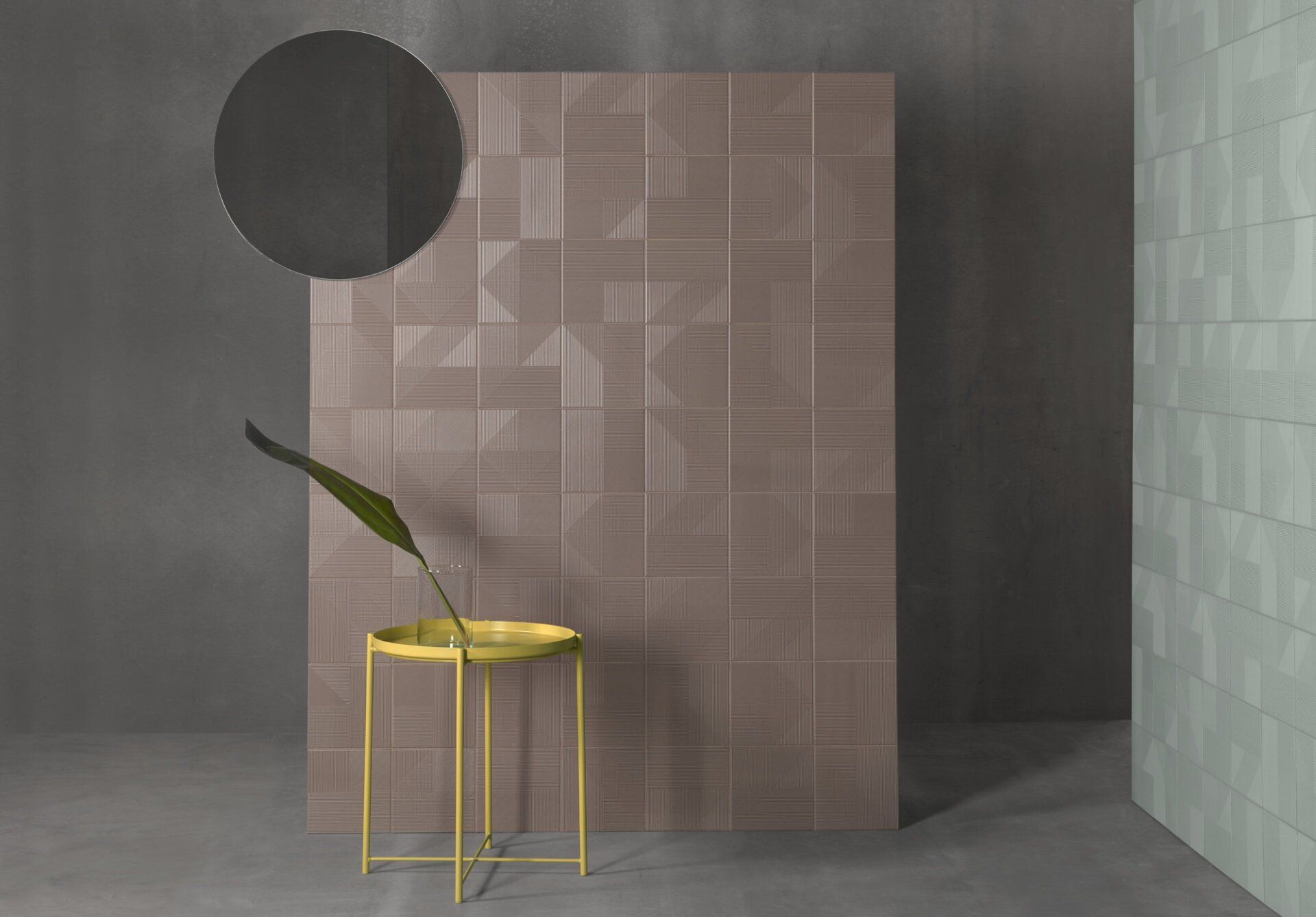 geometric pattern wall tiles, yellow side table, abstract decor