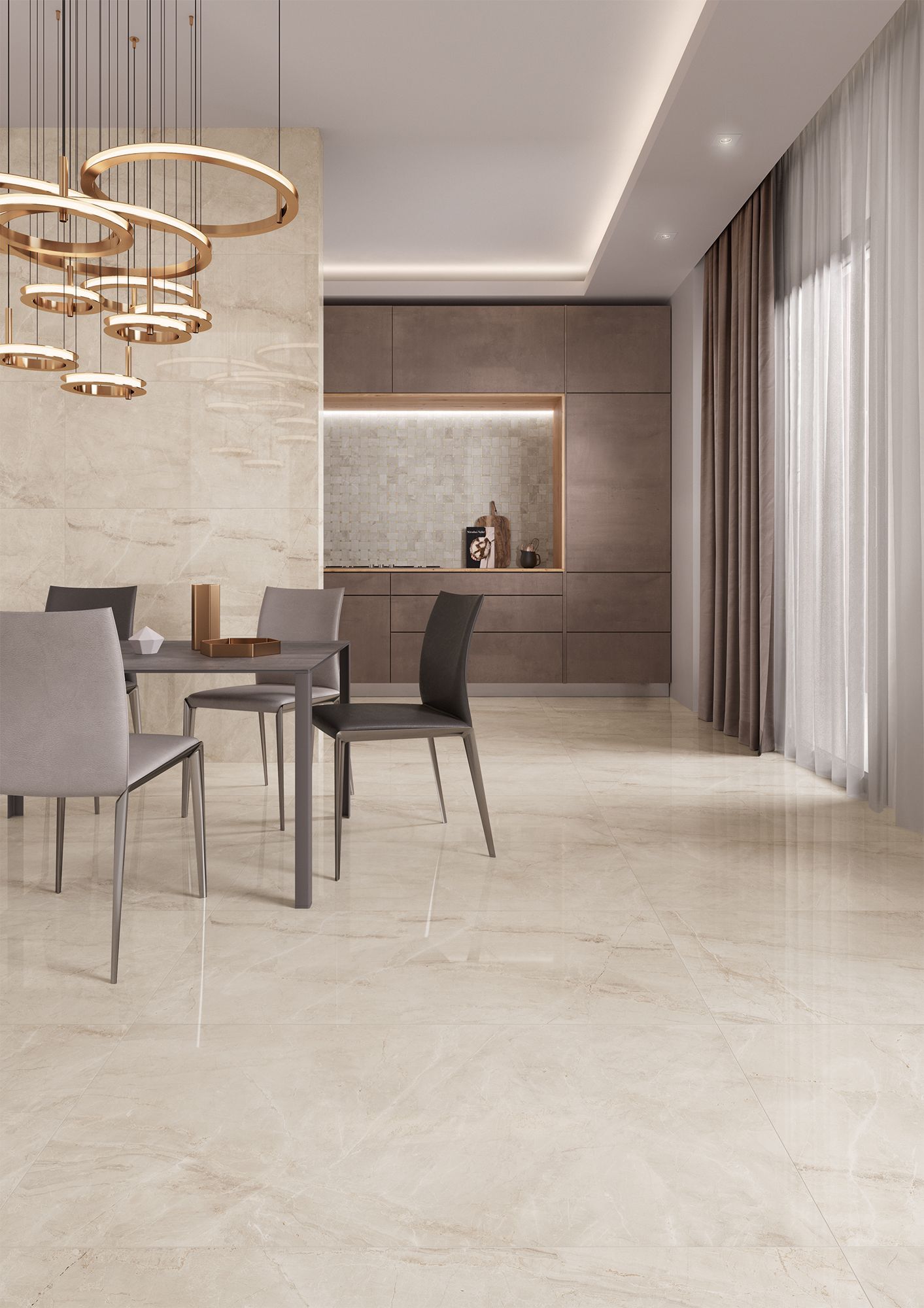A modern dining room featuring polished beige marble floor tiles, dark gray dining chairs, and a sleek black table. The space is illuminated by gold ring-shaped pendant lights, and the neutral tones create a refined atmosphere.