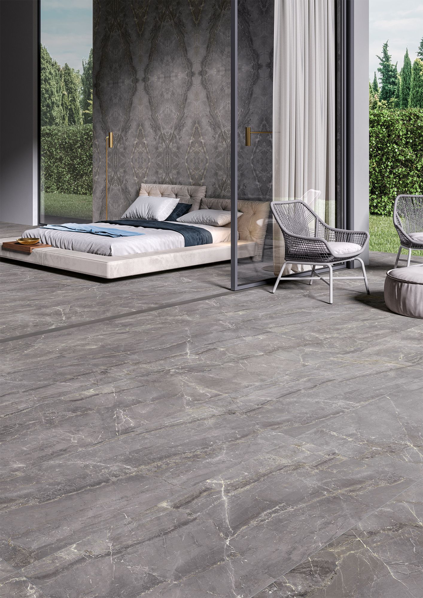 A luxurious bedroom featuring dark gray marble-effect tiles covering both the floor and accent wall. Large windows offer an expansive view of a lush green garden, and the room is furnished with a modern bed and seating area.
