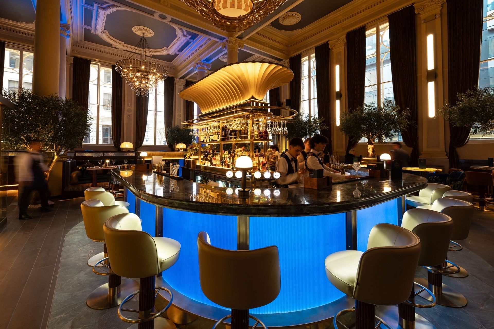 The Cut and craft bar in Manchester surrounded in chairs and wood effect floor tiles