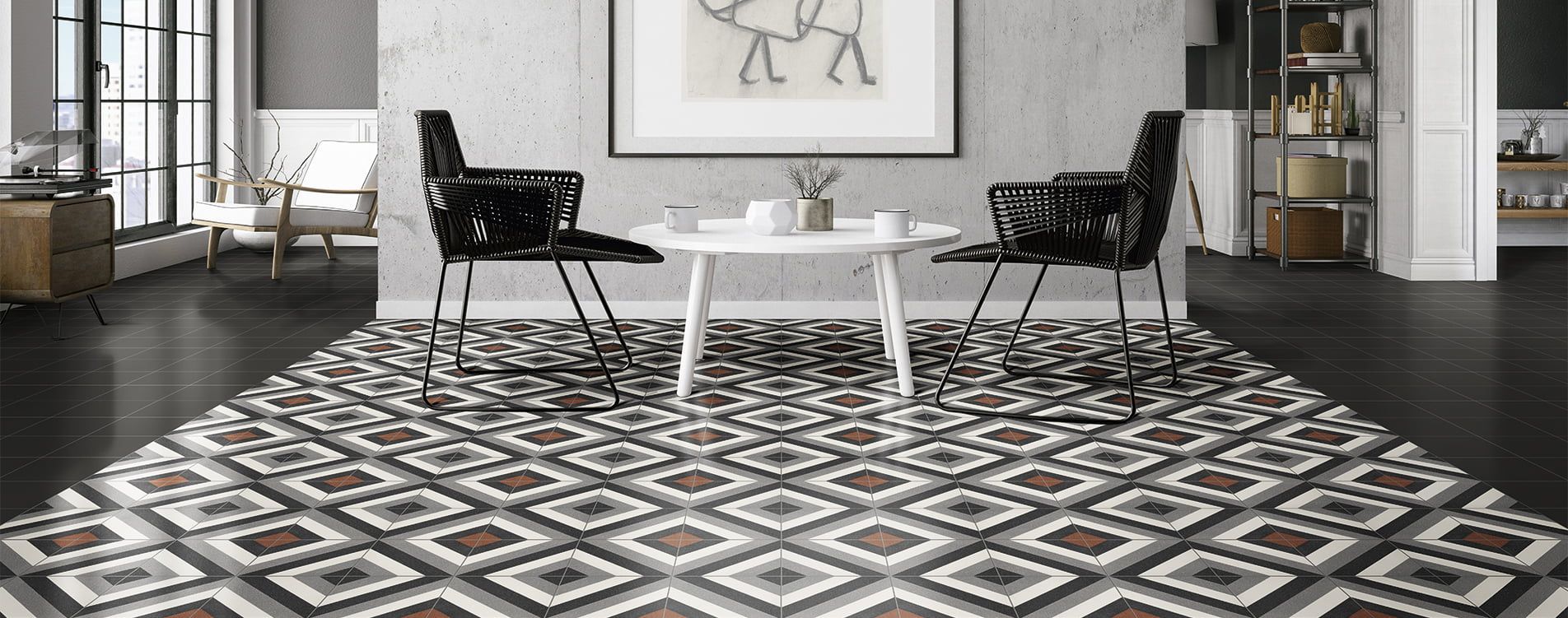 Black and red patterned tile used on the floor of a seating area