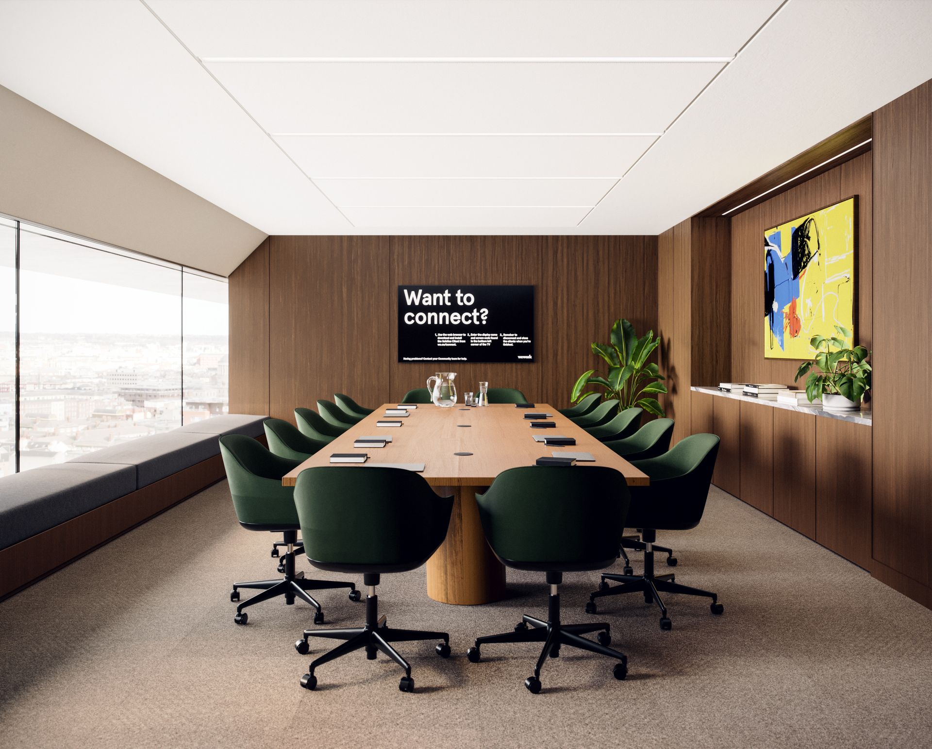 Main meeting room with terrazzo tiled floor wooden desk with green office chairs