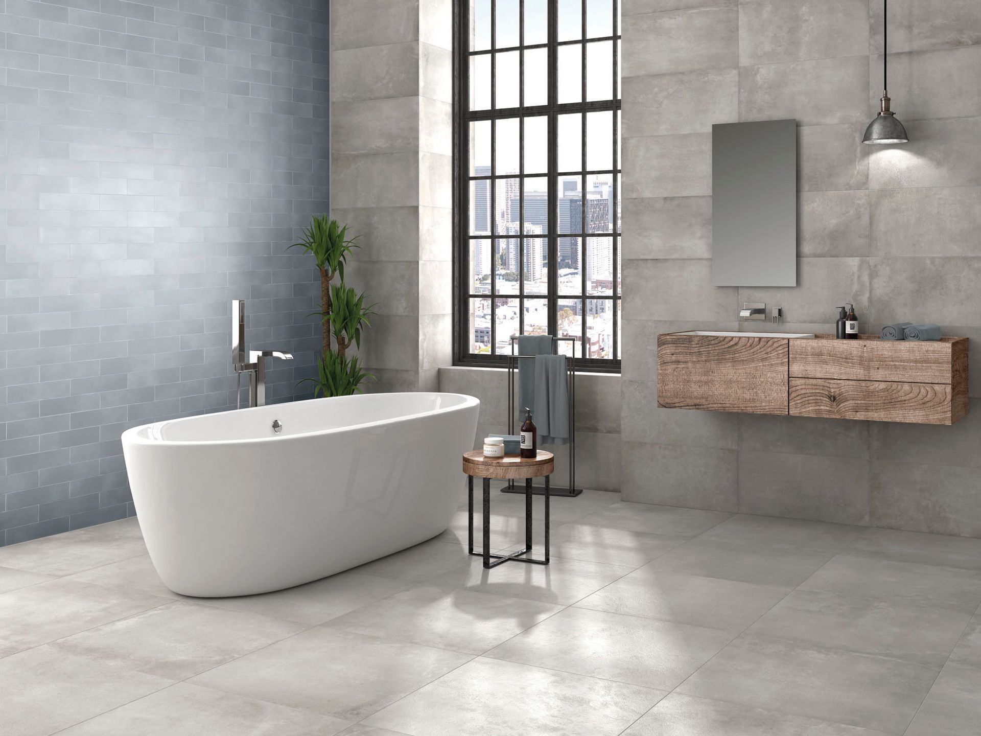 Blue metro wall tiles with concrete floor tiles