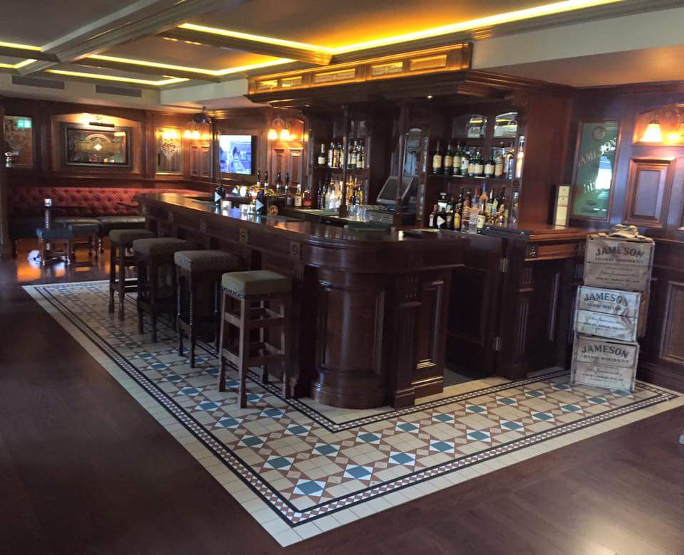 geometric pattern floor tile , bar decor, bar stool, pub floor tile