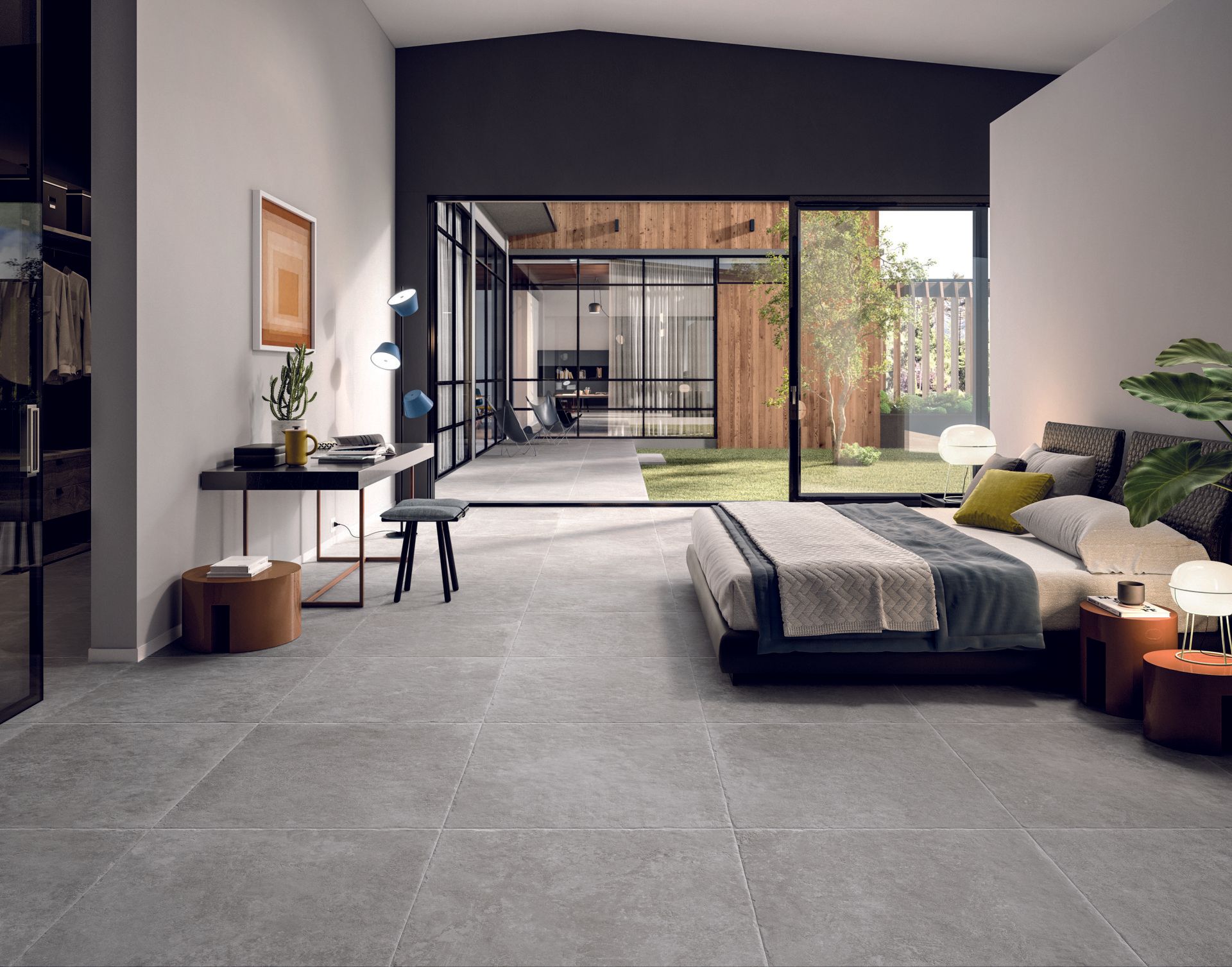 limestone effect tiles within a bedroom design with floor to ceiling windows