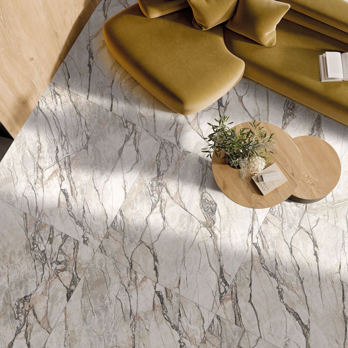 living room floor using marble effect porcelain tiles suitable for wall and floor and slip resistant under the yellow couch and wood table