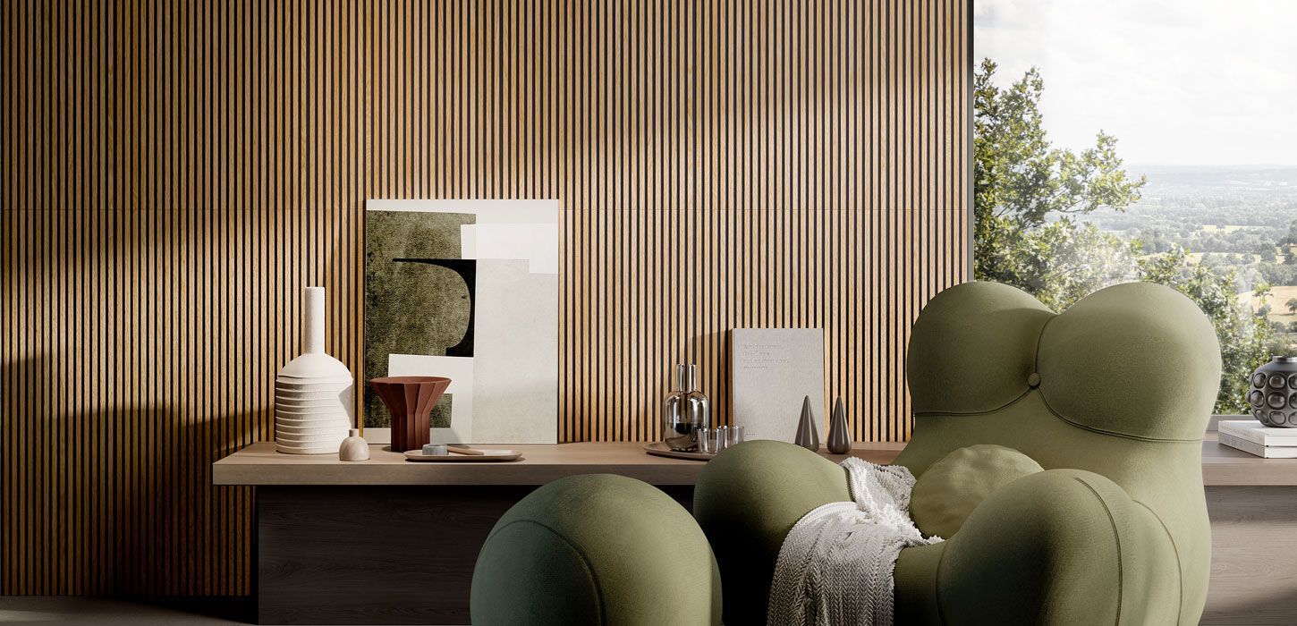 Fluted 3D beige tiles on a feature wall with a green sofa infront of it