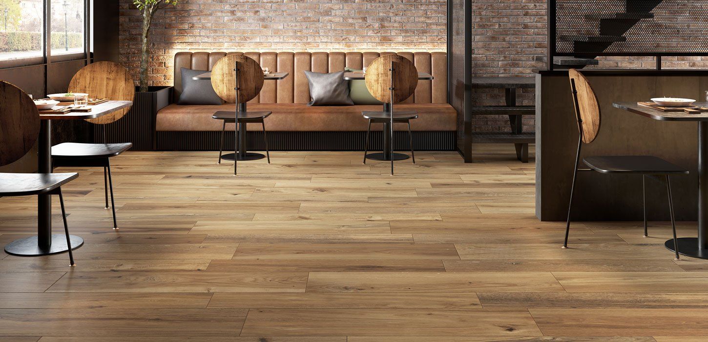 restaurant seating area with wood effect floor tile