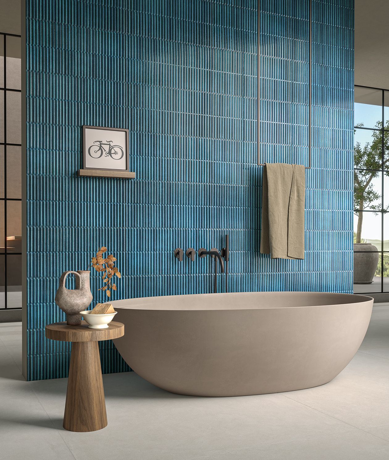 kit kat tiles in a blue bathroom with an oval bathtub