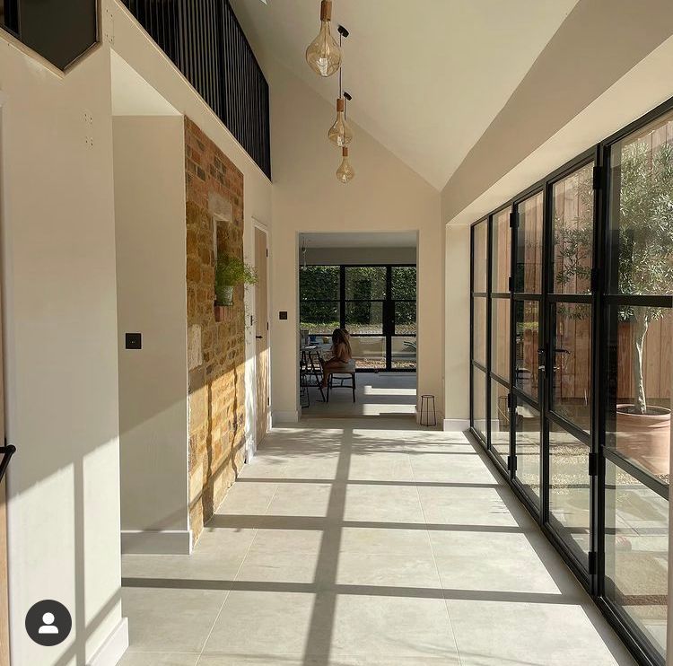 Milan floor tiles used in a corridor with big open window panes