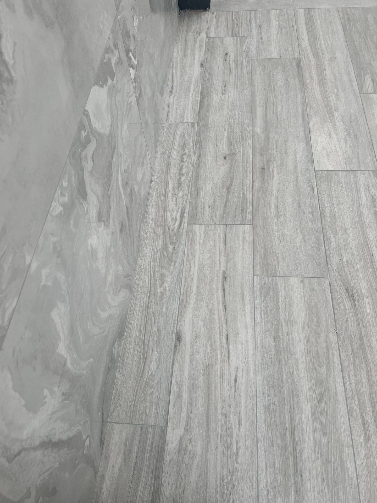 Corby tile showroom grey wood tile flooring
