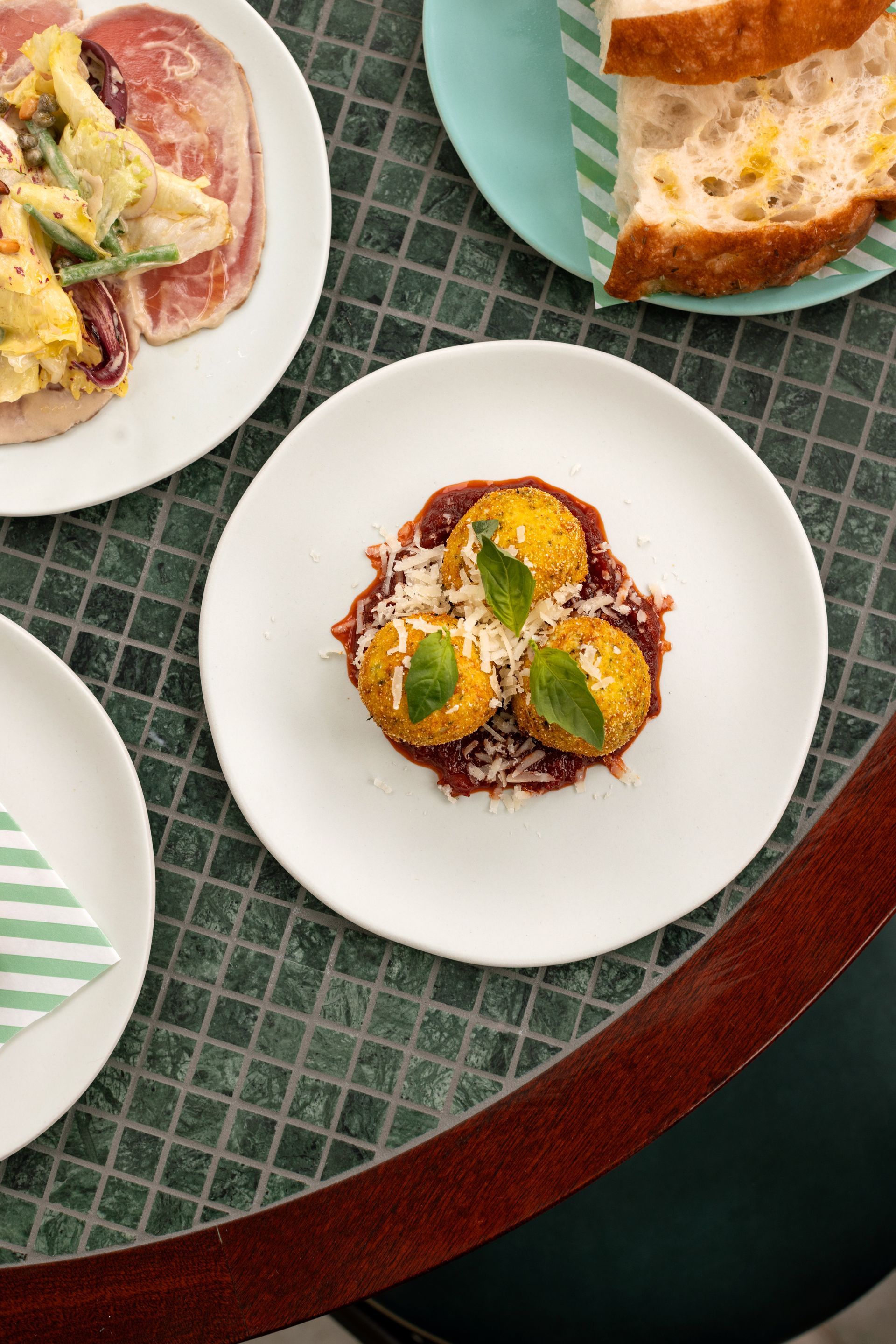 3 yellow balls of food