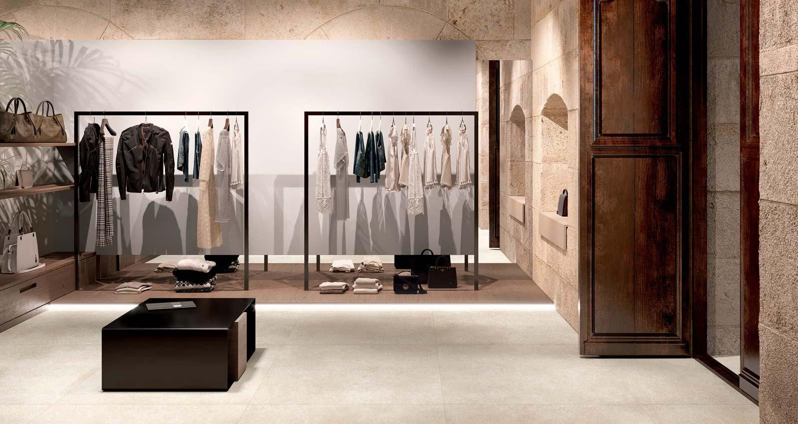 limestone effect tiles , commercial usage , clothing shop with a clean aesthetic , beige aestheitc