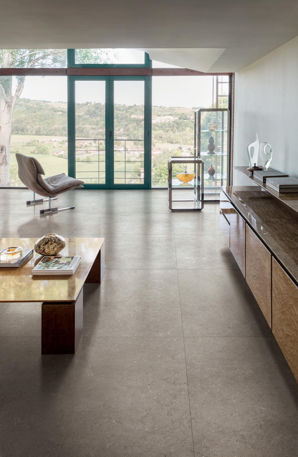 limestone effect tiles , kitchen design with a floor to ceiling windows and marble style storage surface