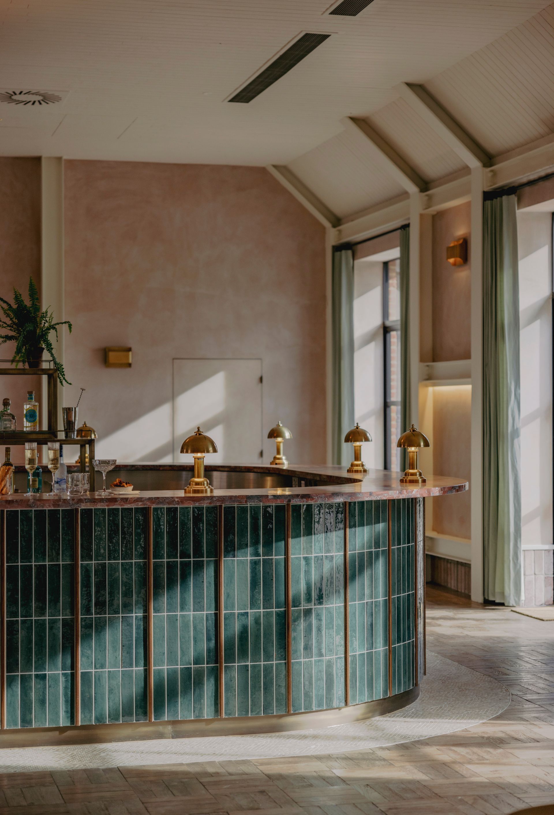 Close up of the golf lodge bar with salerno gloss tiles in it