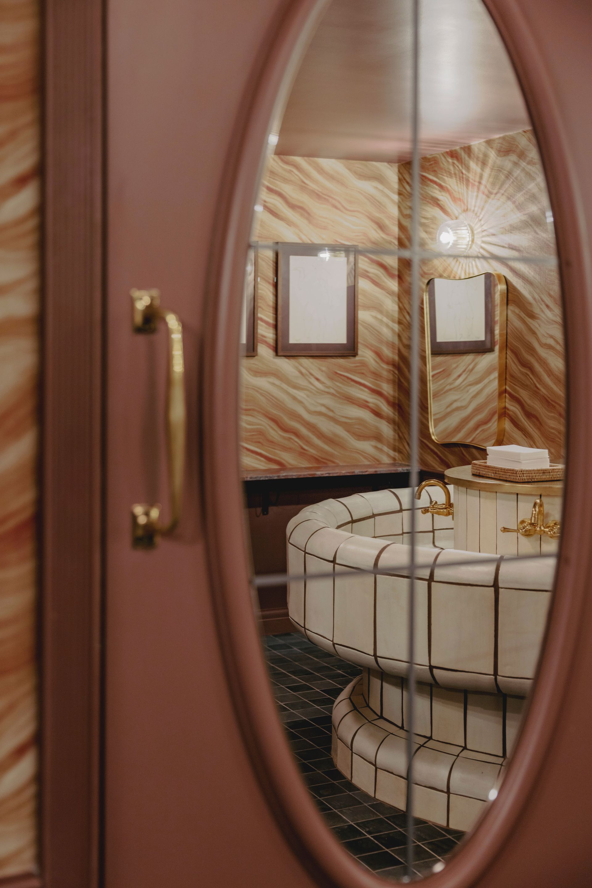 golf lodge washroom in a mirrors reflection