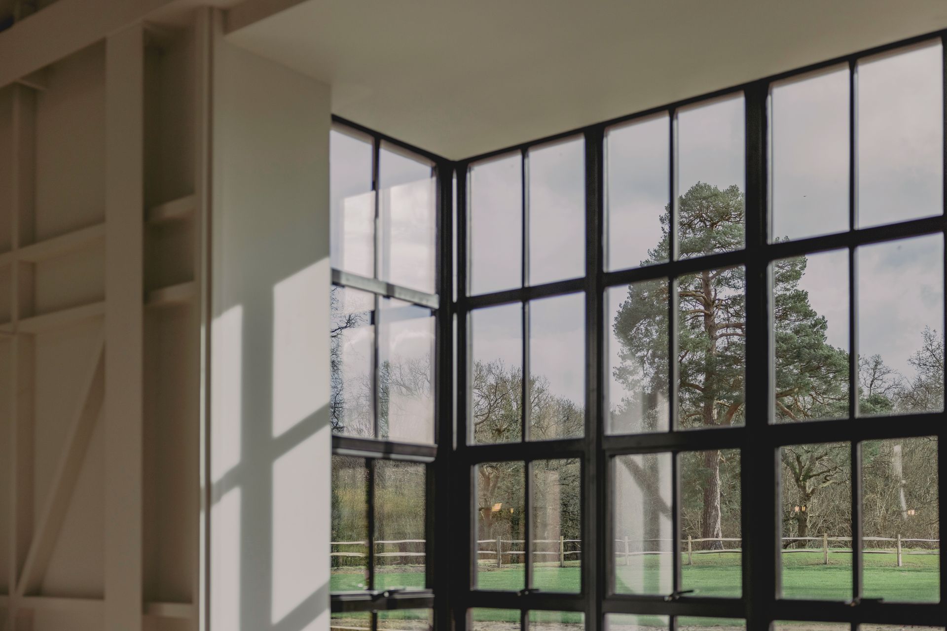 looking out of golf lodge window panes