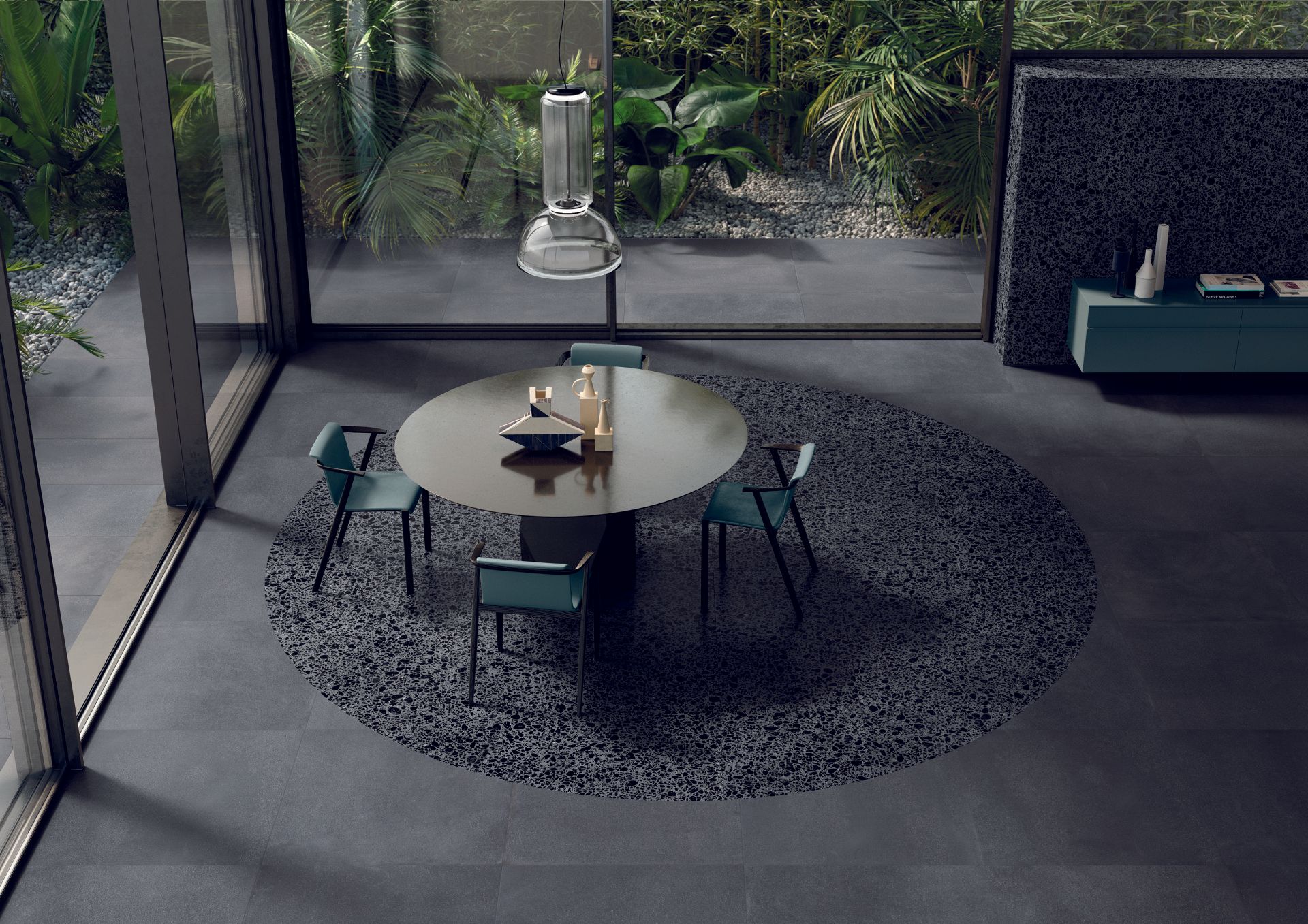 terrazzo tiles, dark terrazzo within a aesthetic , round dining room with grey chairs