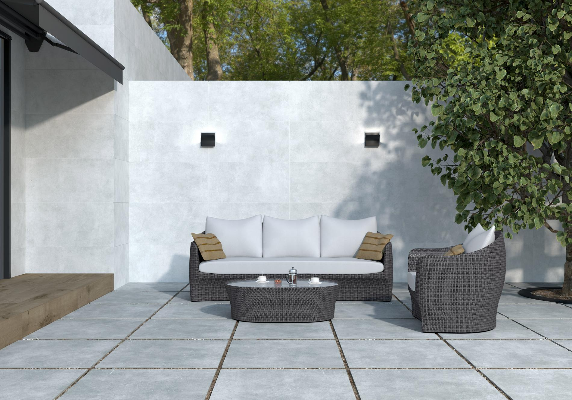 patio tiles, tree , coffee table , white cushions