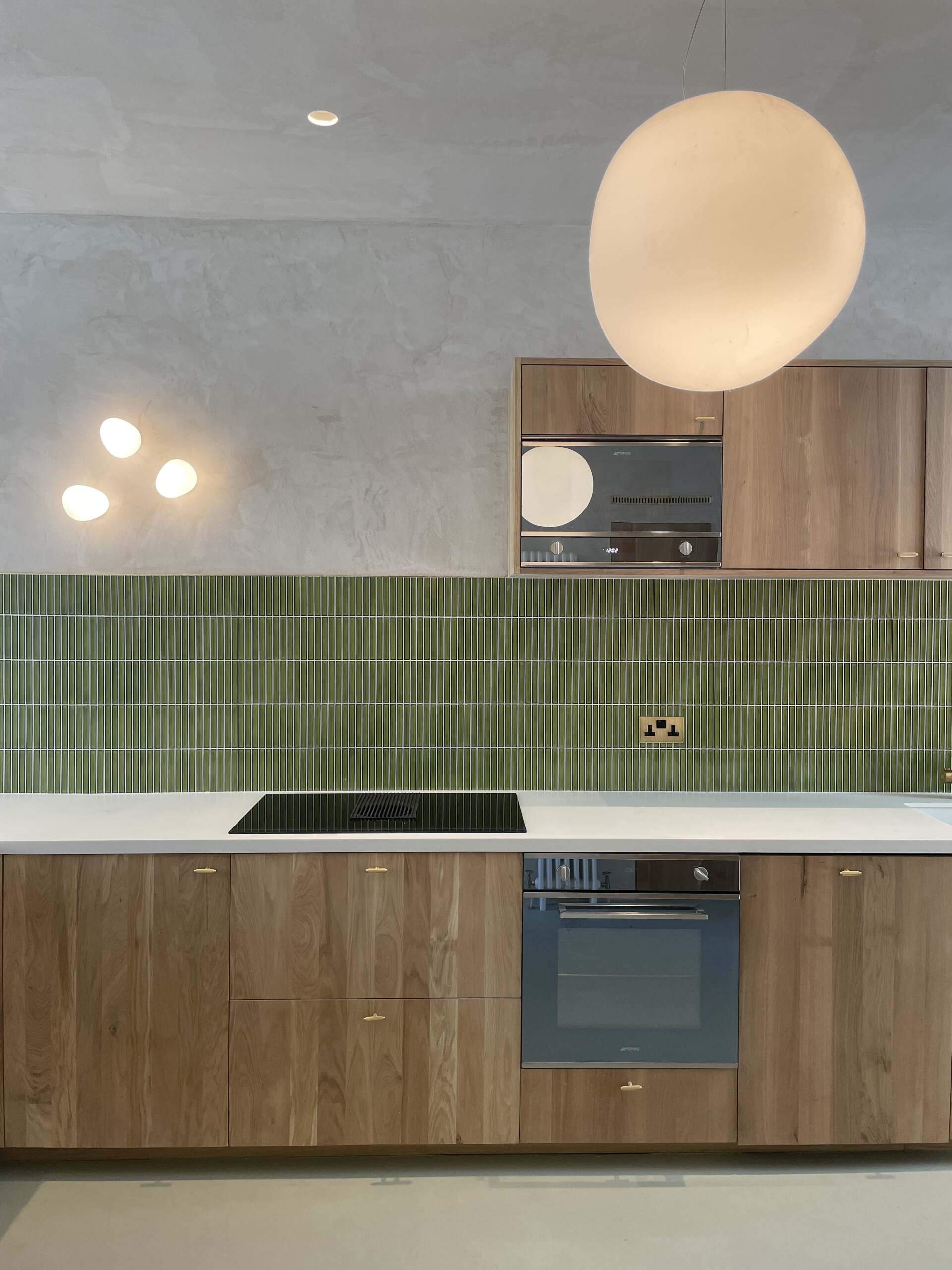 Kitchen Room shot of KitKat green wall tiles