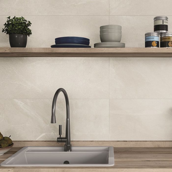 limestone effect tiles,  kitchen splashback ,domestic aesthetic with a shelf above the sink