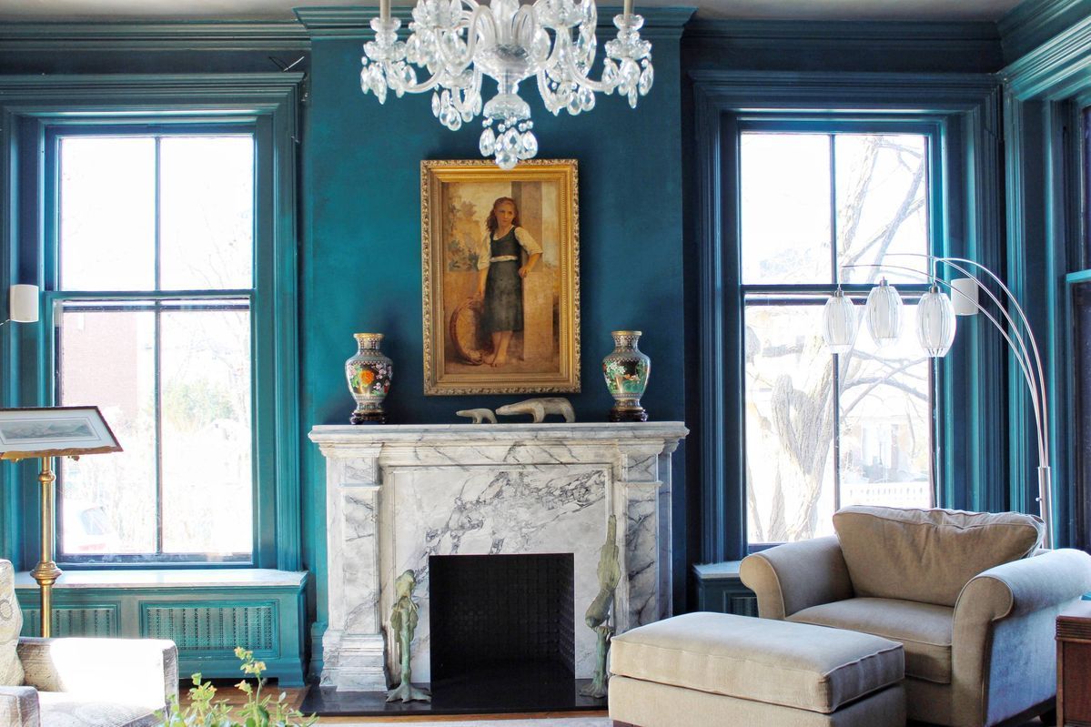 Lyon tiles - White The waterford mansion living area, including a grand marble fireplace and deep blue walls