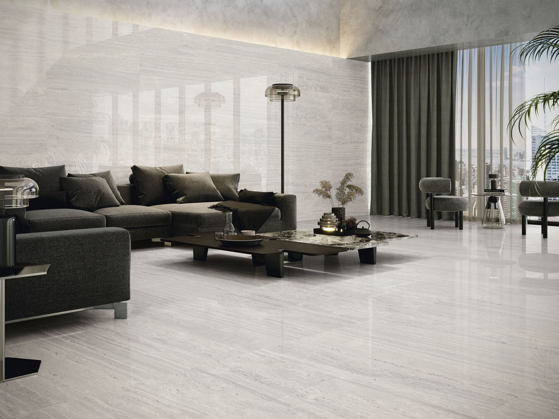 Livingroom with Grey floor tiles and black sofas