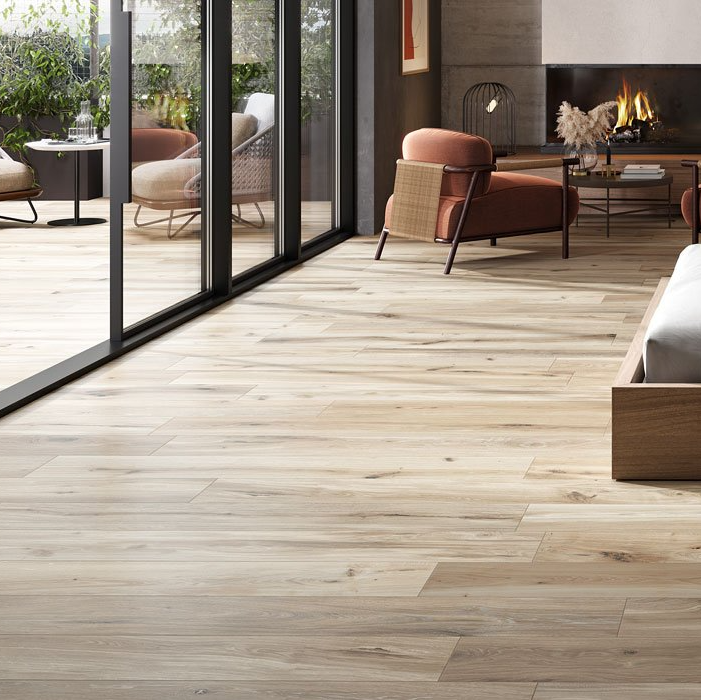 patio tiles, black coffee table, patio sitting area, lounge, inside/outside tiles