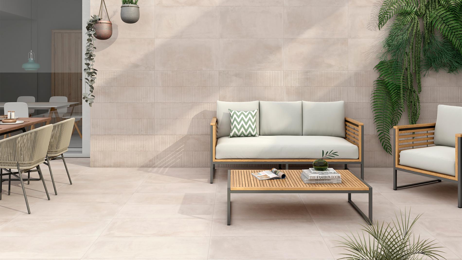 Close up of outdoor seating area tiled with cream colours floor and wall tiles