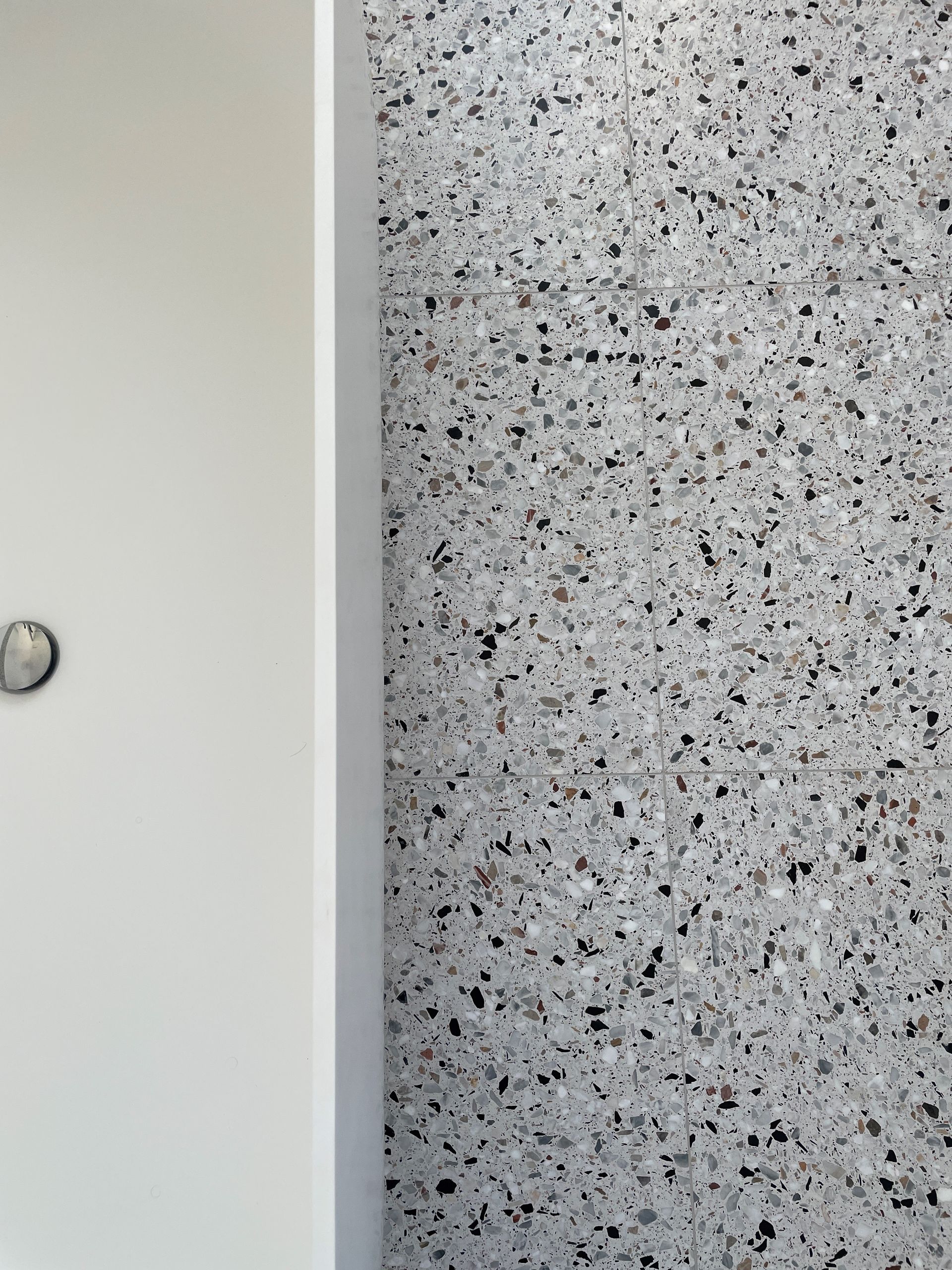 close up of terrazzo effect tile in a bathroom