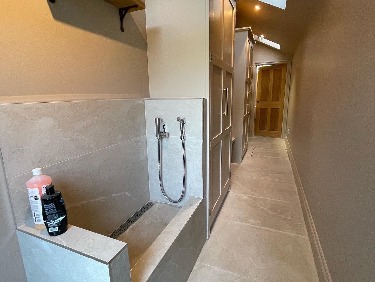 Limestone effect tile used in corridior walk way