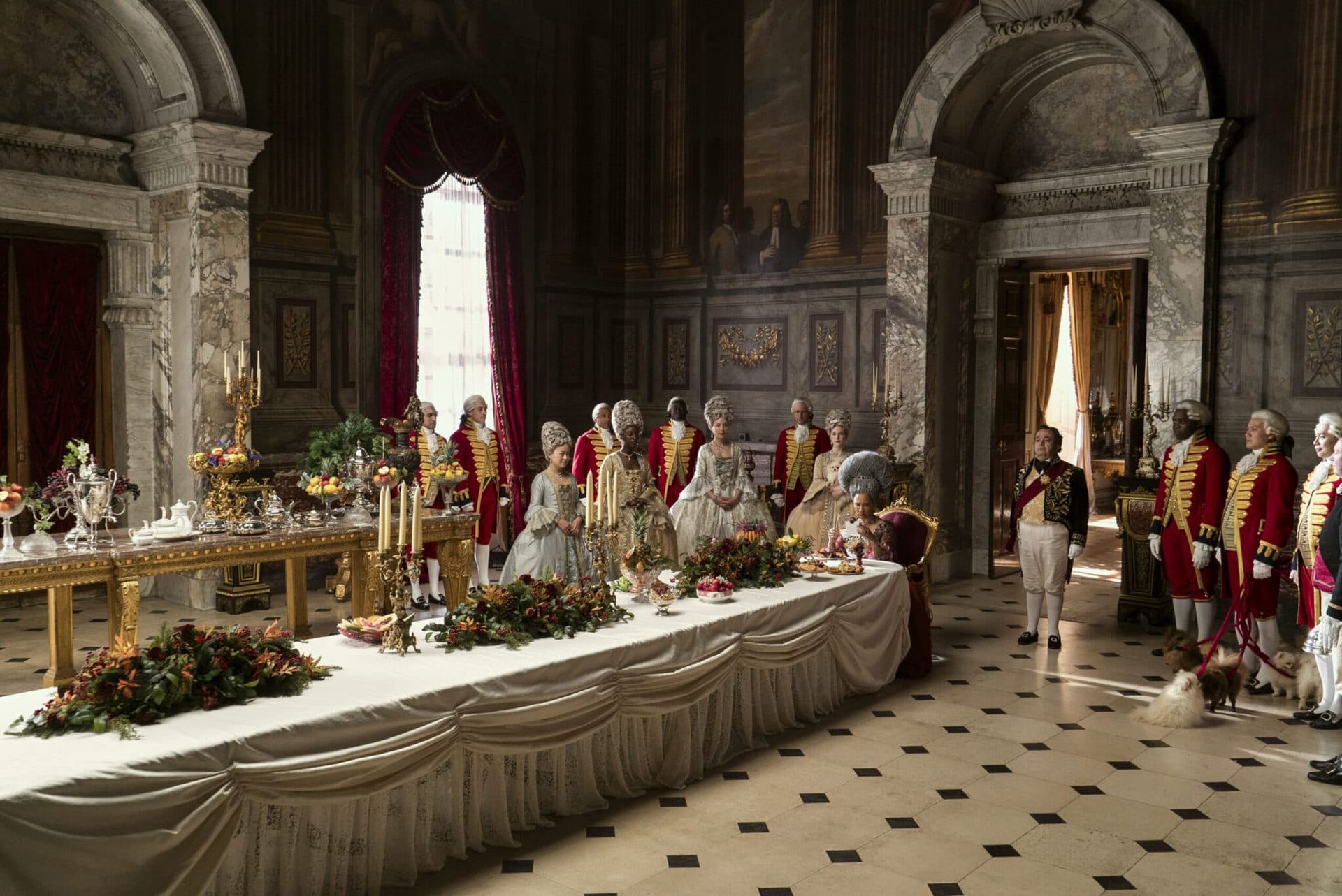 Bridgerton scene, including the queen and staff