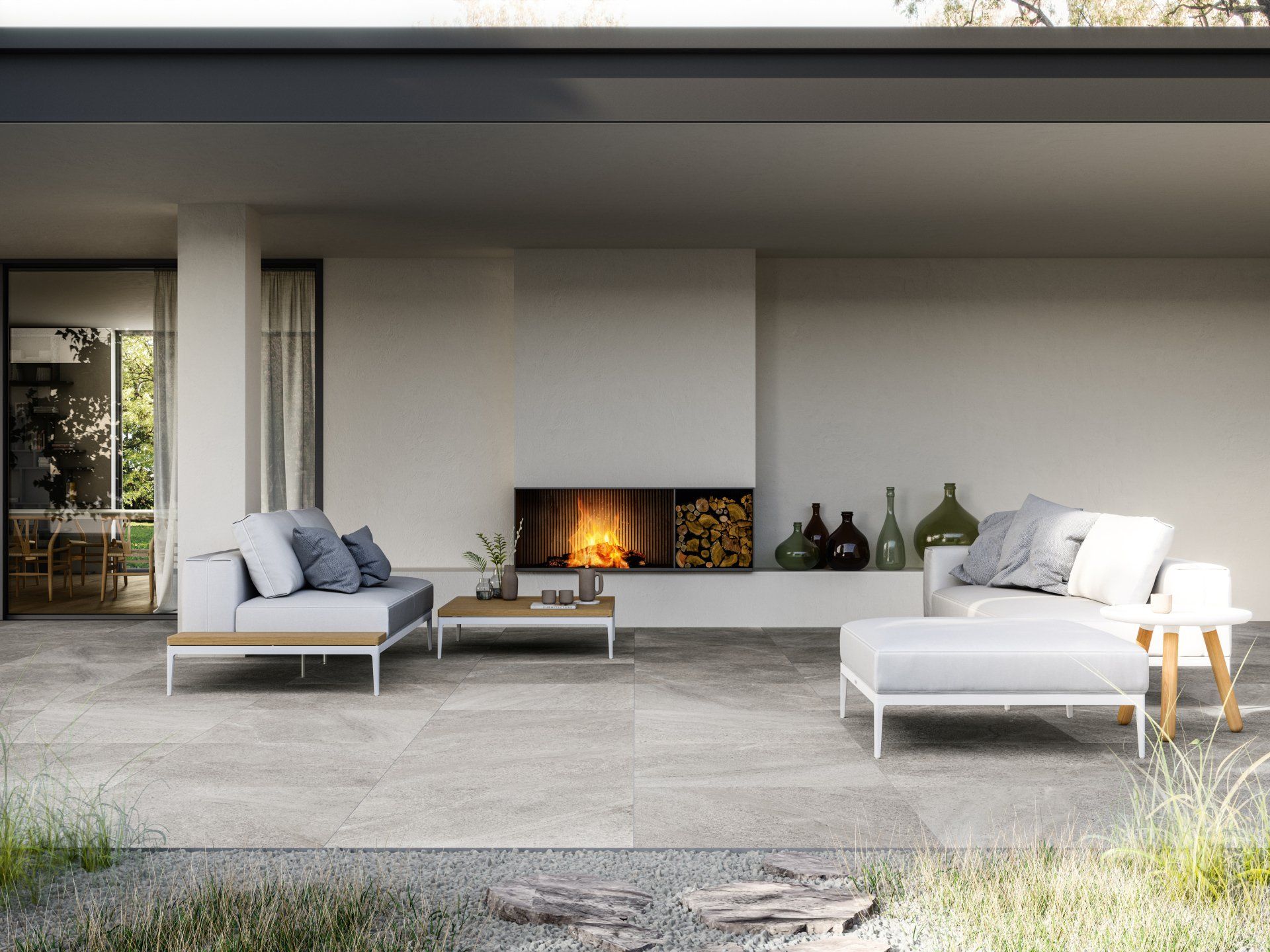 patio tiles, fireplace , green vase, light grey couch