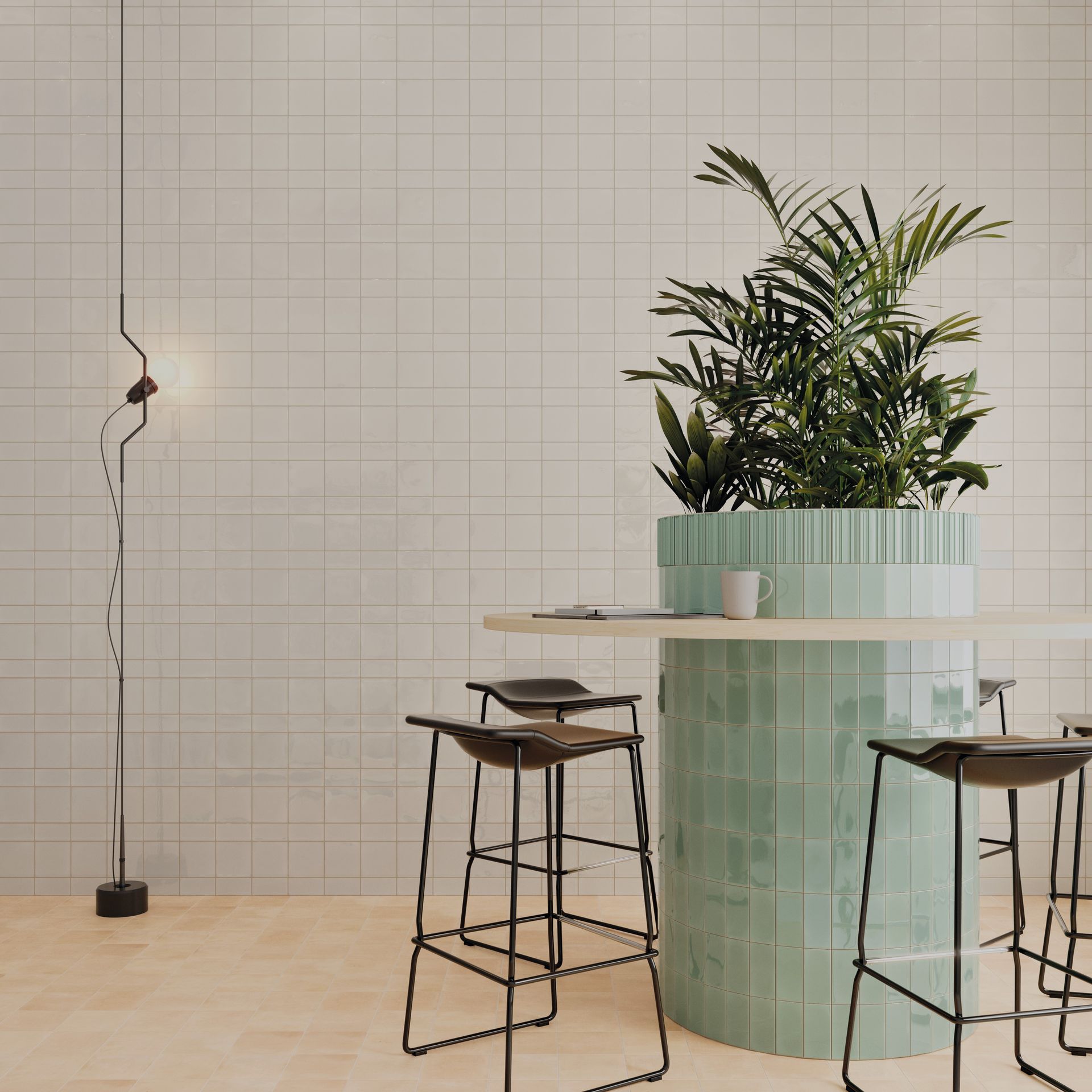 2 chairs and a table with a big green plant Infront of feature tile wall