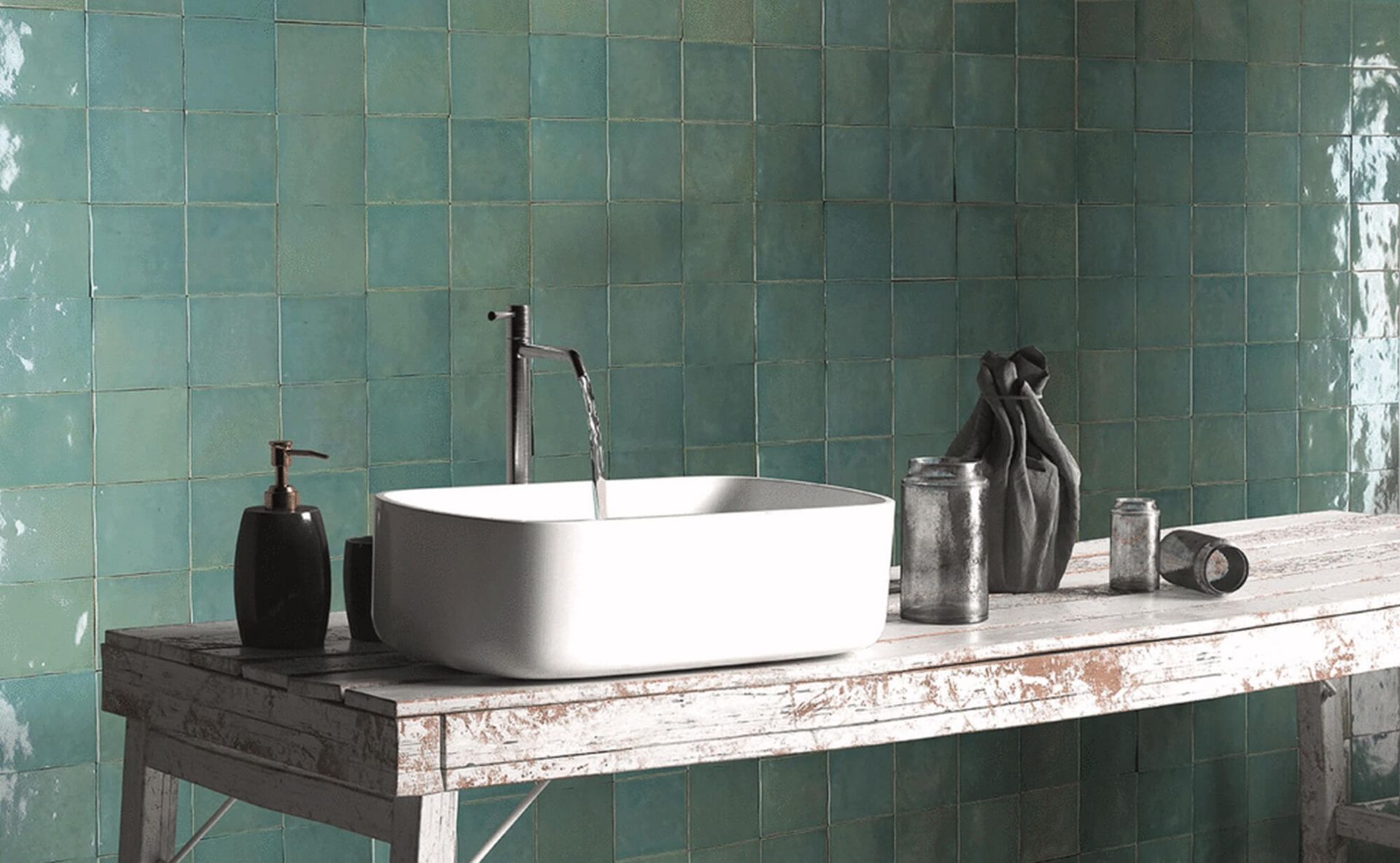 Turquoise square gloss tiles used on the wall for a splashback feature