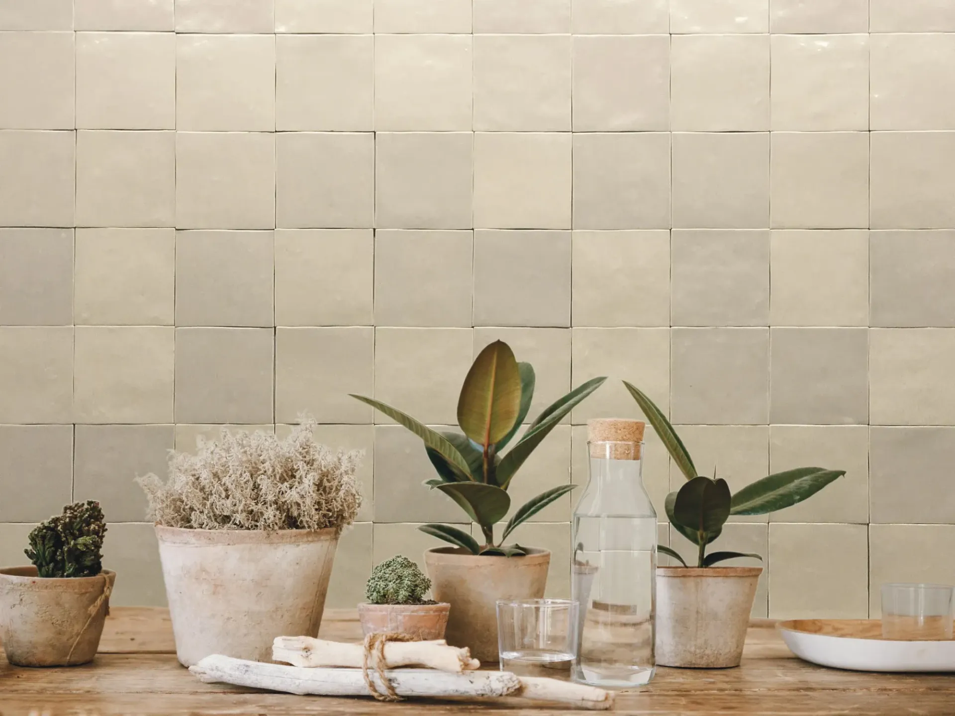 close up from a bathroom side showing off white square tiles