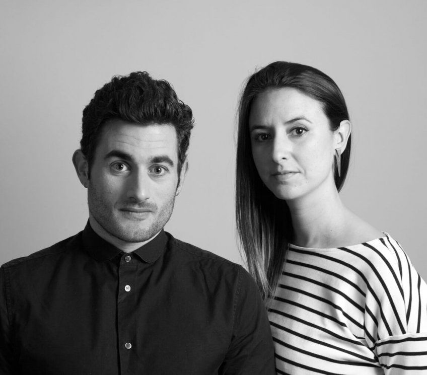 a man and a women in blackj and white