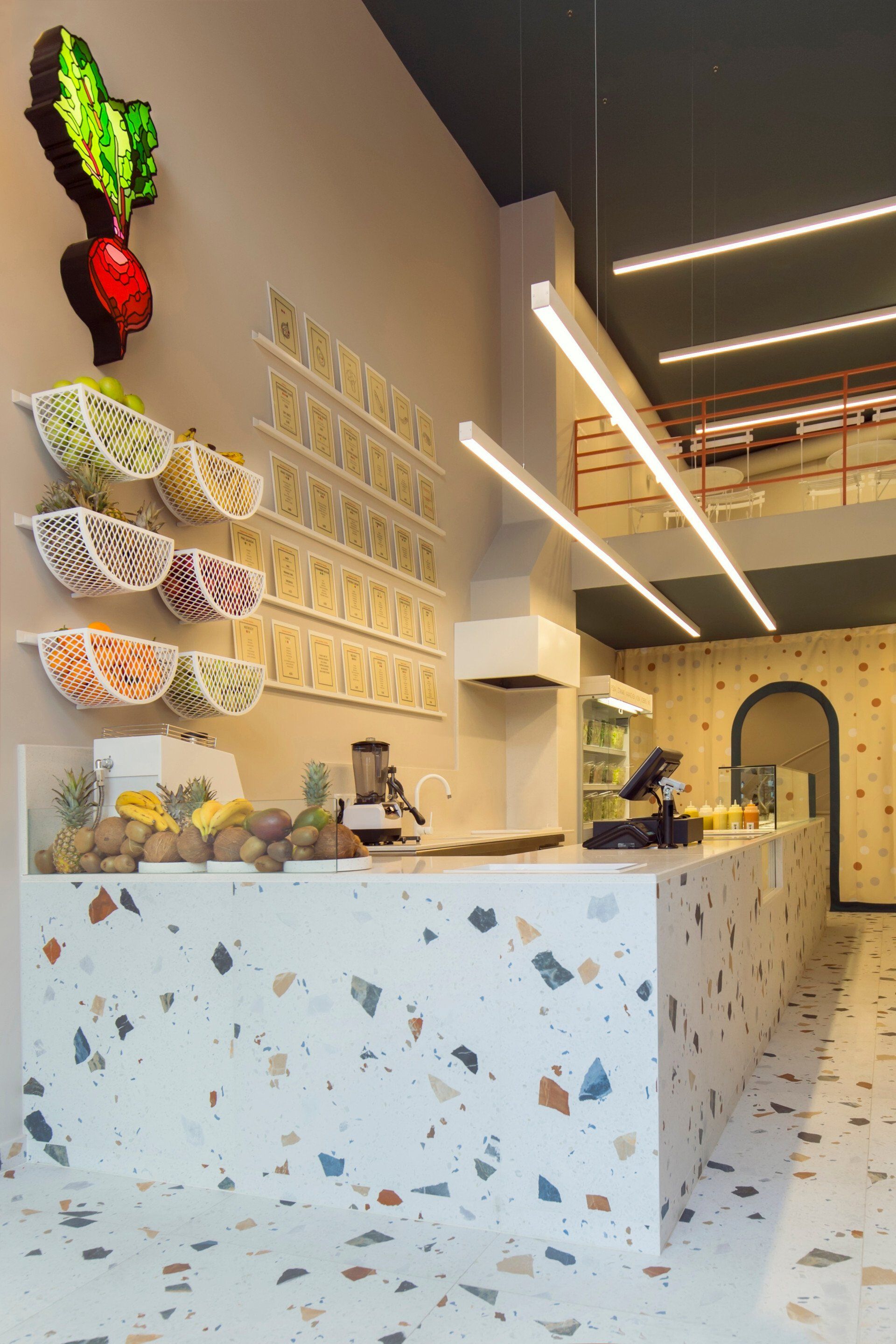 a fruit shops till made from white terrazzo effect tile