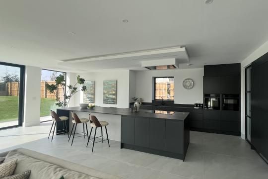large format kitchen tiles used on the floor of this kitchen