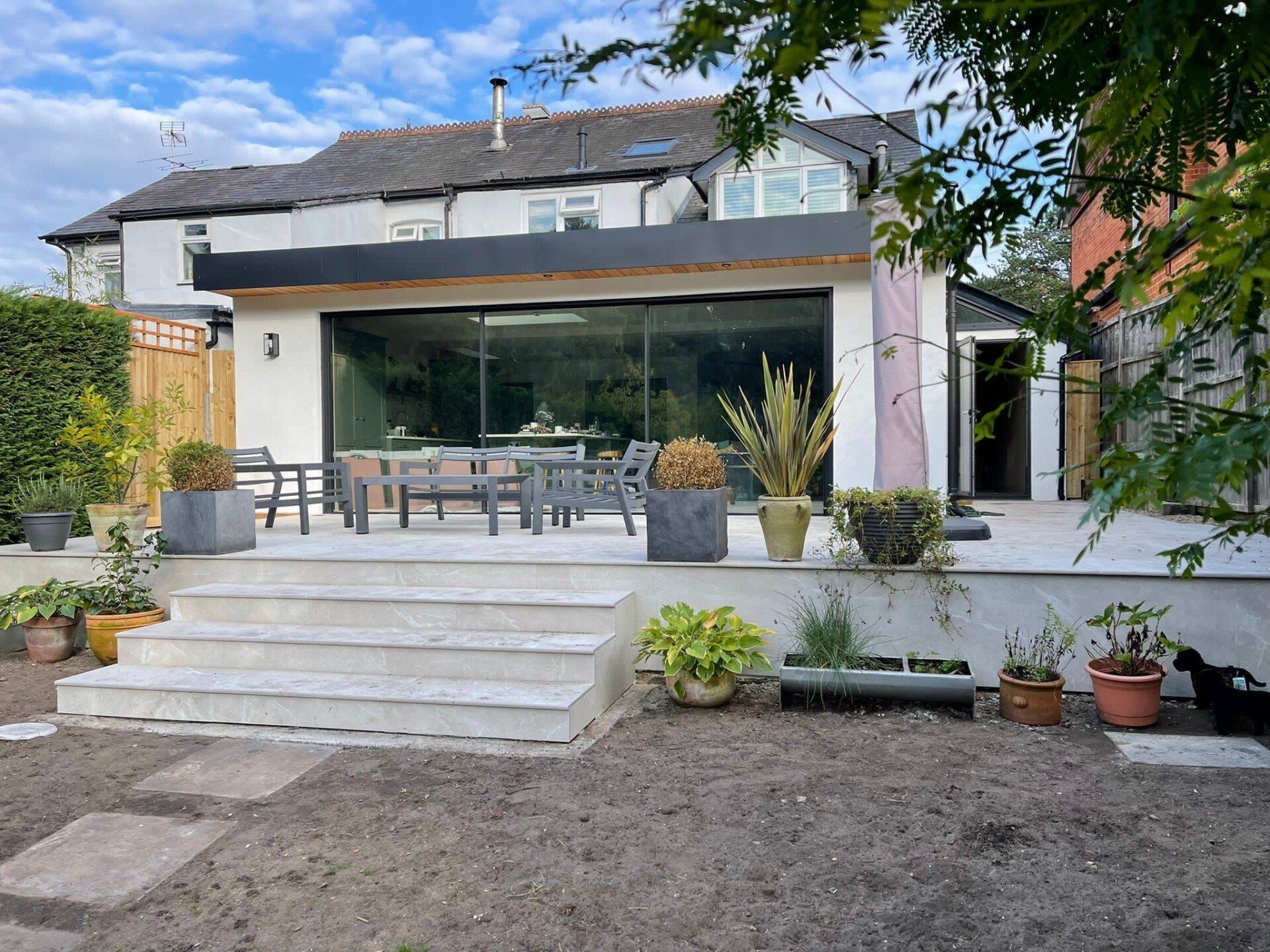 Outdoor picture of house from its backgarden