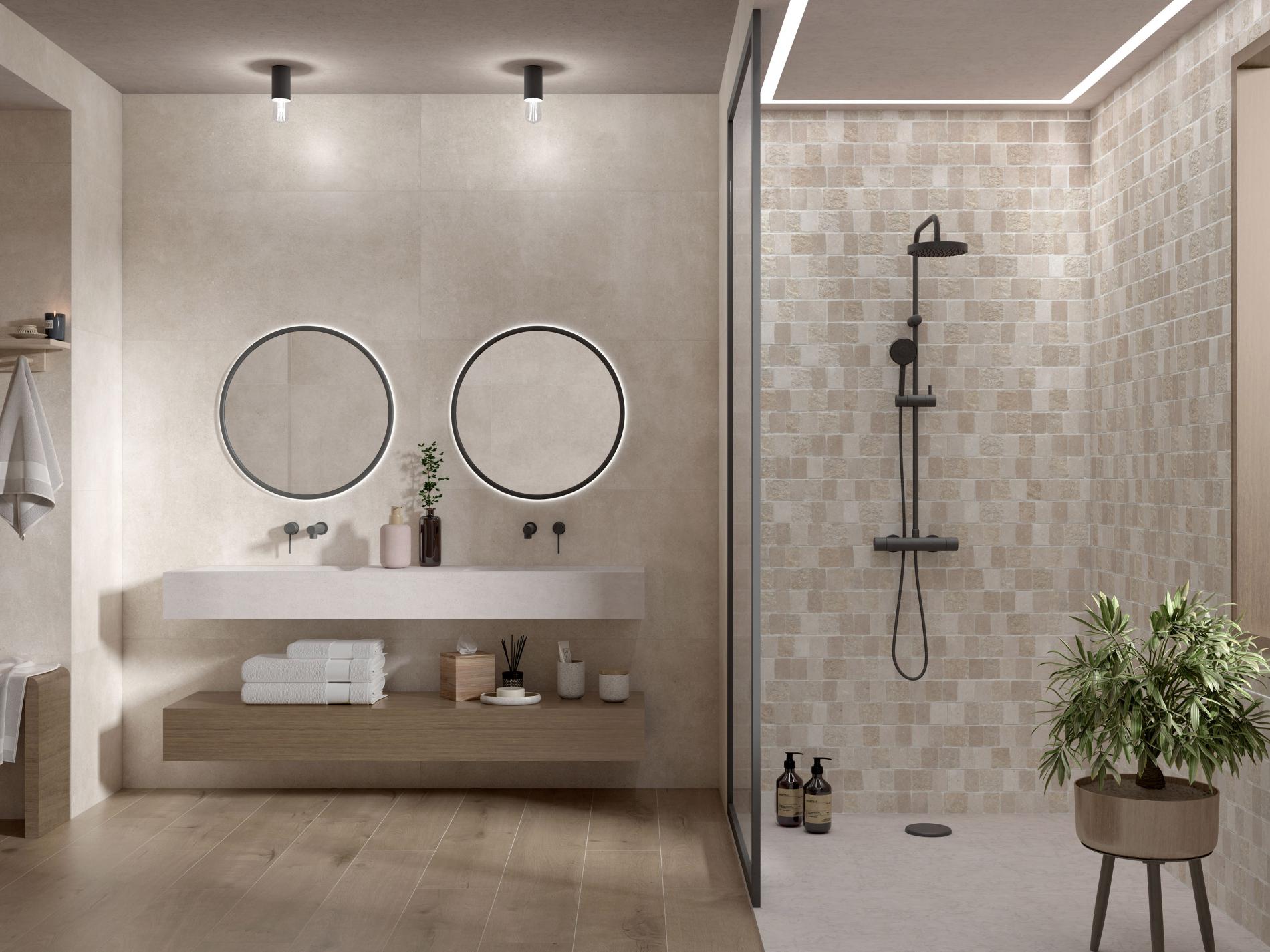 Room shot of a bathroom with unique shower tiles and barnwood floor tiles