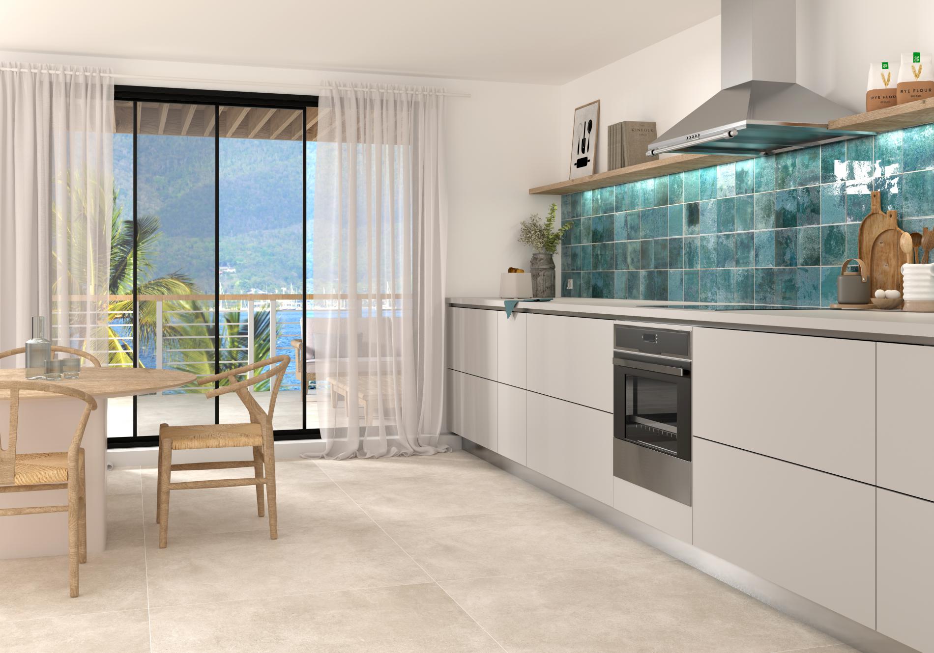 Modern kitchen with concrete tile floor effect with blue gloss splashback