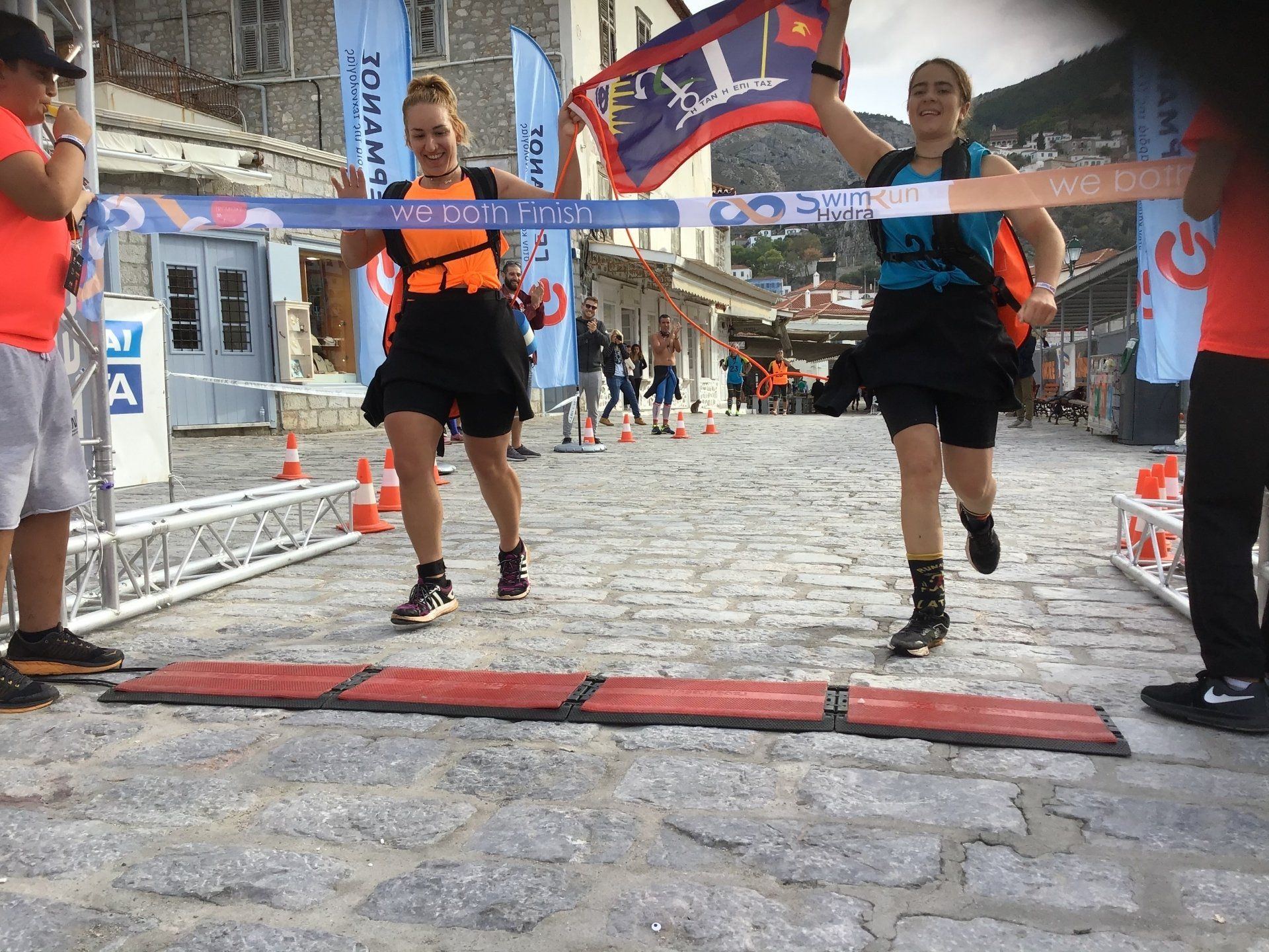 Arabella & Kathryn crossing the finish line of the core distance SwimRun Hydra 2019 event.