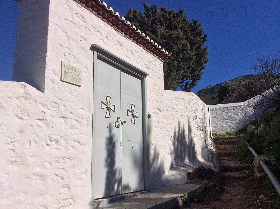 Walking to Aghia Fotini Cemetery and Monastery on Hydra Island Greece.