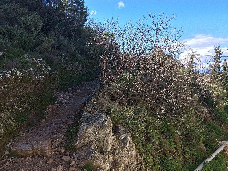 Walking to Aghia Fotini Cemetery and Monastery on Hydra Island Greece.
