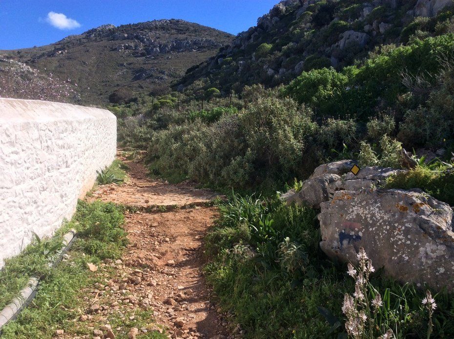 Walking to Aghia Fotini Cemetery and Monastery on Hydra Island Greece.